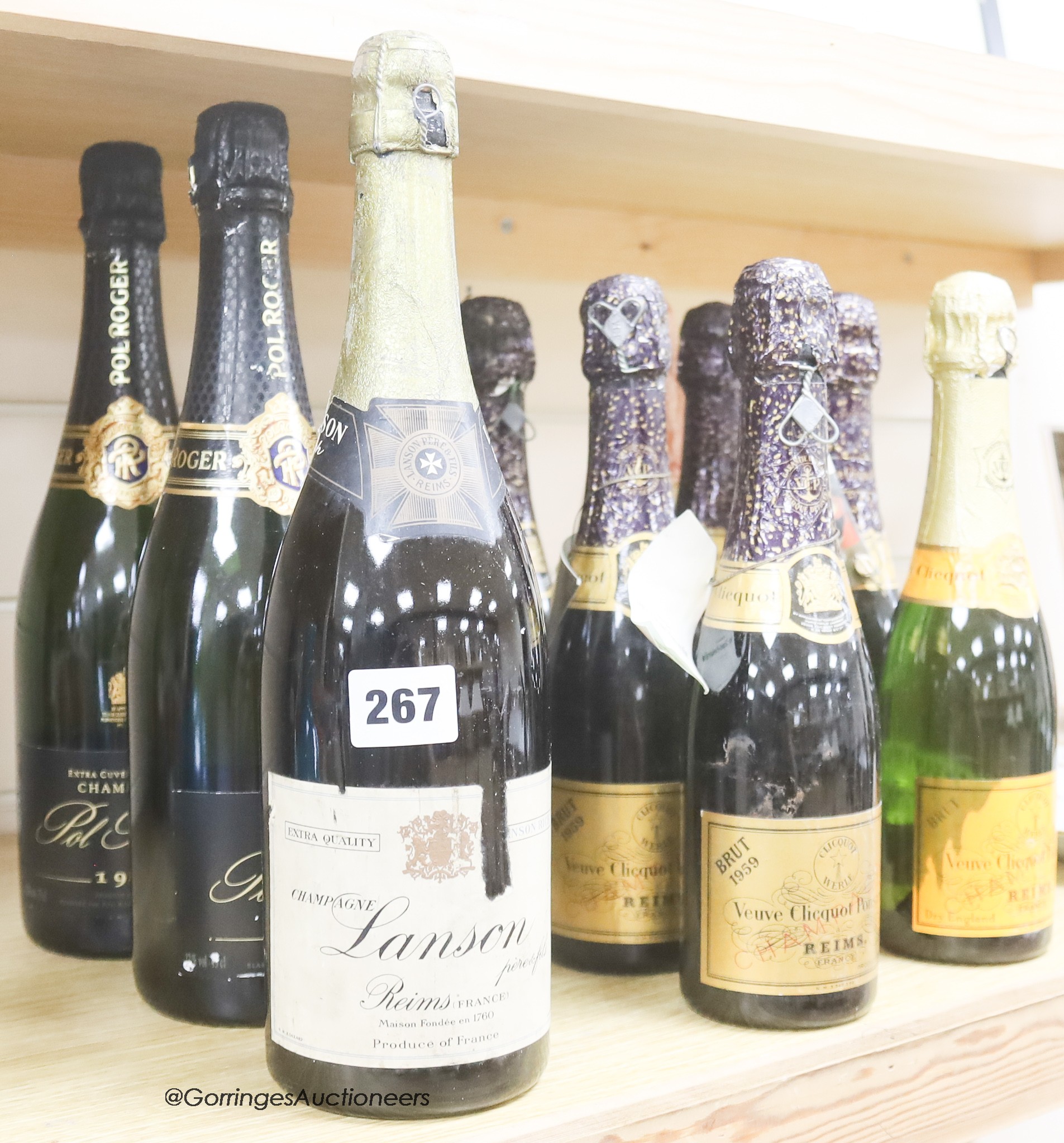 Four assorted champagnes including Bollinger, 1955 and two Pol Roger, 1998 and seven half bottles including five Veuve Cliquot Brut 1959.
